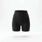 Panty gainant invisible femme — packshot produit, short mi-cuisse noir, finition seamless invisible